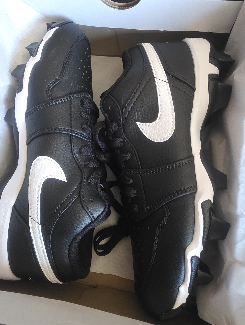 Nike Black and White Jordan 1 Low Youth Cleat